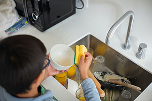 boy-washing-the-dishes